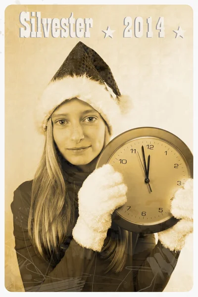 Retro postcard with girl in santa claus hat and clock — Stock Photo, Image