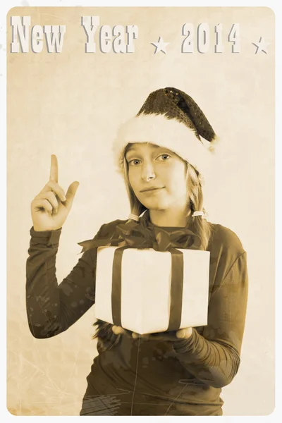 Retro postcard - girl in santa claus hat and show sign — Stock Photo, Image