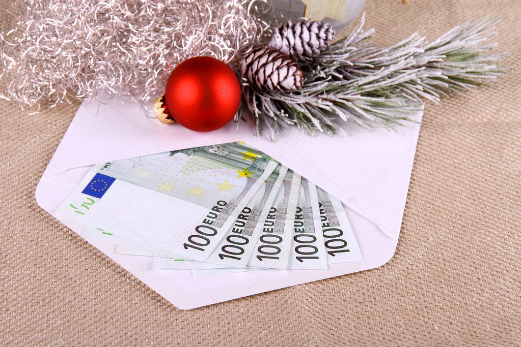 500 euro money in envelope with Christmas deco