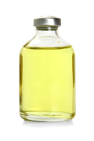Una bottiglia gialla con olio essenziale — Foto Stock