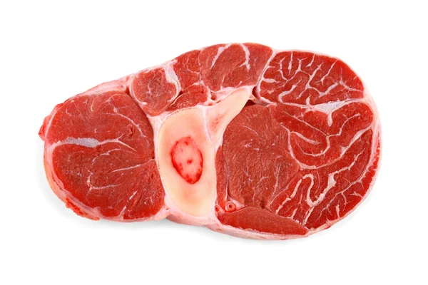 Carne fresca di stinco di vitello su sfondo bianco — Foto Stock