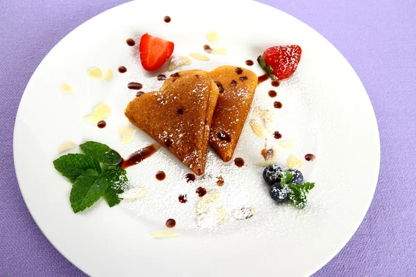 Two pancakes heart and chocolate, strawberry, mint arrow — Stock Photo, Image