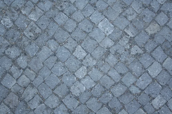 灰色为背景的铺路石 — 图库照片