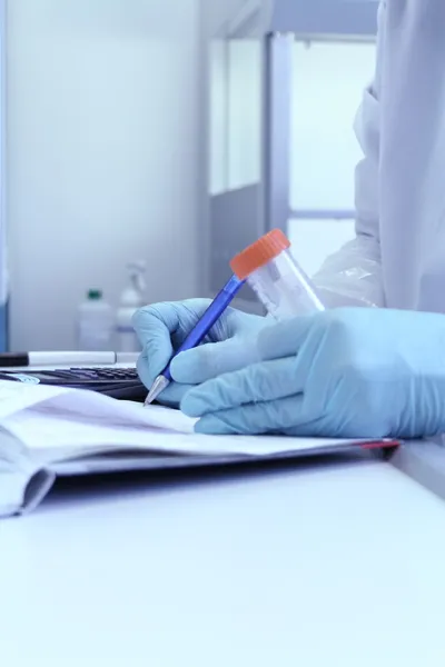 Laboratory Technician write test results from lab — Stock Photo, Image