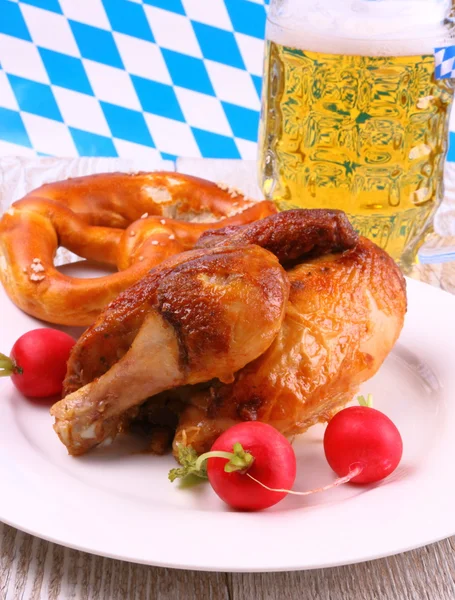 Oktoberfest chicken and pretzel, beer, radish — Stock Photo, Image