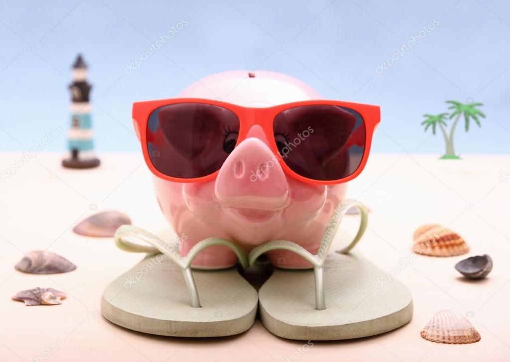 Funny Piggy bank with sunglasses, holiday background
