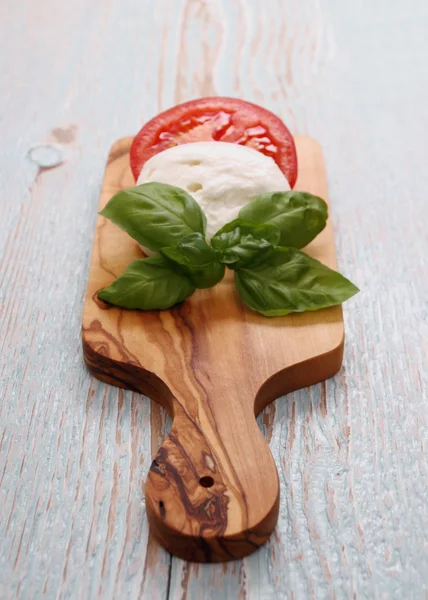 Basil leaf, mozzarella cheese and tomato slice — Stock Photo, Image