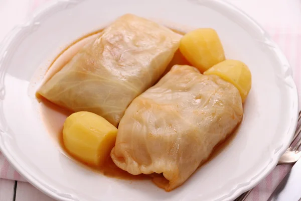 Cabbage rolls with potato and sauce — Stock Photo, Image
