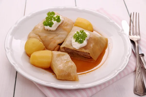 Stuffed cabbage rolls with potato, sour cream — Stock Photo, Image