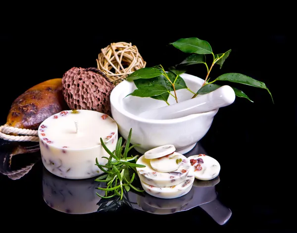 Spa concept with rosemary in black — Stock Photo, Image