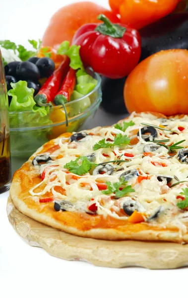Pizza with ham, pepper and olives over white Stock Picture