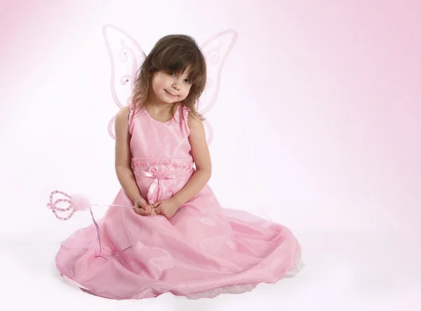 Beautiful girl in a fairy costume with butterfly wings — Stock Photo, Image