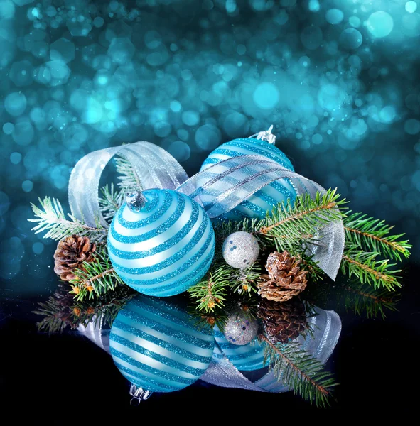 Christmas card with Christmas balls on a dark background — Stock Photo, Image