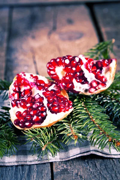 Pomegranate fruit on wooden background — Stock Photo, Image