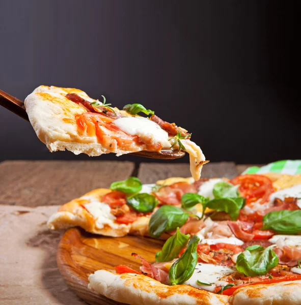 Italian pizza on table — Stock Photo, Image