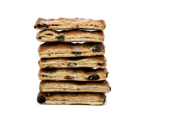 Deliciosos biscoitos saborosos isolados em branco — Fotografia de Stock