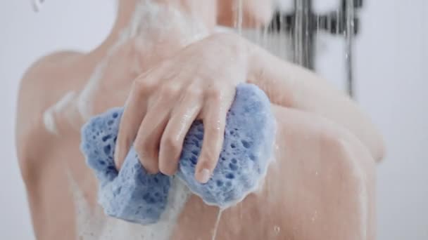 Female taking bath with shower sponge — Stock Video