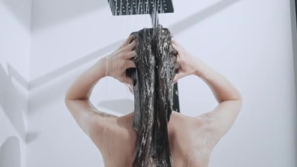 Brunette showering in bathroom — Stock videók