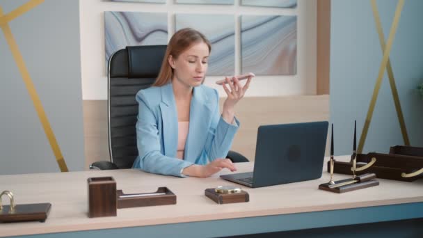 Successful Business Woman Sitting Desk Holding Smartphone Using Voice Assistance — Videoclip de stoc