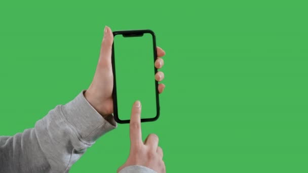 Unrecognizable Person Close Holding Smartphone Tapping Green Screen Using Mobile — 비디오