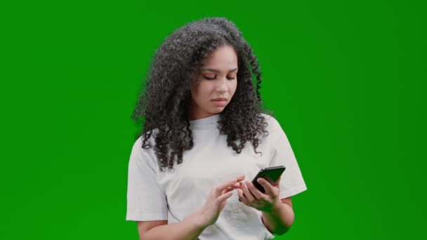 Surprised Woman Curly Long Hair Dressed White Shirt Holding Smartphone — Vídeos de Stock