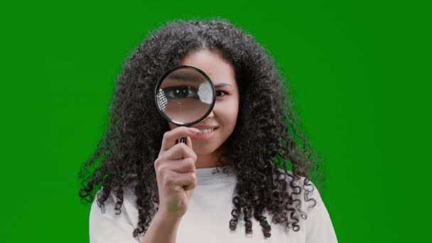 Woman Curly Long Hair Dressed White Shirt Holding Magnifying Glass — Vídeos de Stock