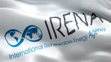 IRENA logosu. Ulusal 3d Uluslararası Yenilenebilir Enerji Ajansı logosu el sallıyor. IRENA 'nın kusursuz bir animasyon işareti. Uluslararası Yenilenebilir Enerji Ajansı bayrağı HD Arkaplan - New York, 4 Temmuz 2021