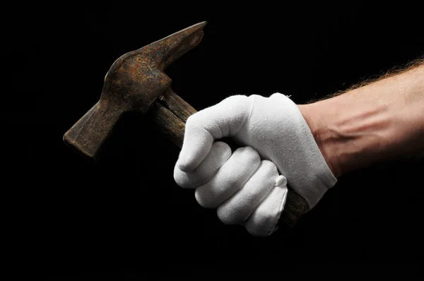 Hamer en een hand — Stockfoto