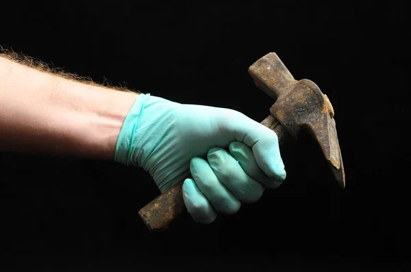 Hammer and a Hand — Stock Photo, Image