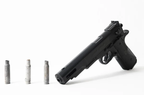 Pistola e balas — Fotografia de Stock