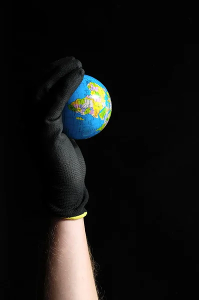 Planeet aarde en een hand — Stockfoto