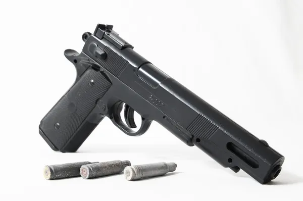 Pistola y balas — Foto de Stock