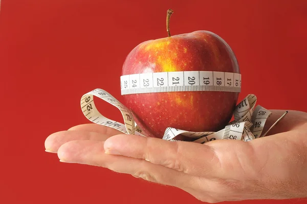 Diet Apple and Meter on the Hand — Stock Photo, Image