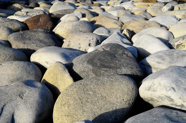 Pedras redondas suavizadas pela água — Fotografia de Stock