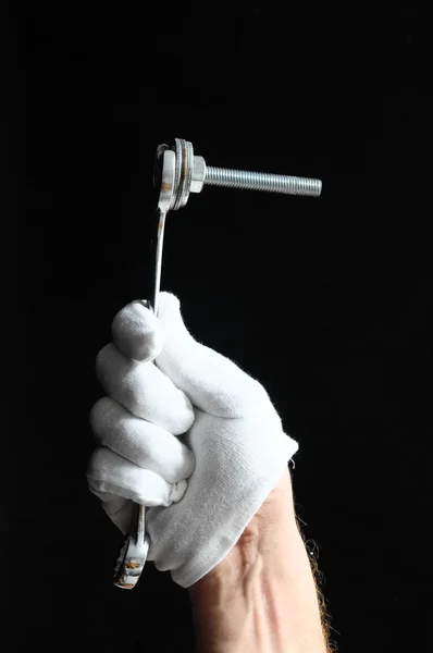 One Key bolts and a Hand — Stock Photo, Image