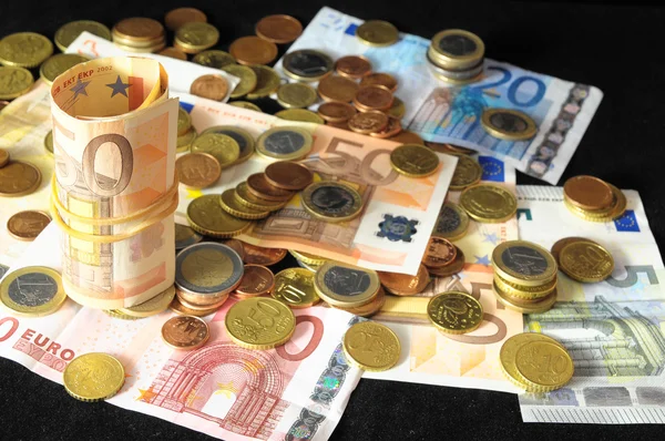 Verspreide geld — Stockfoto