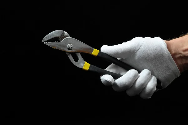 Pliers and a Hand — Stock Photo, Image