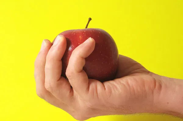 Jabłko na rękę — Zdjęcie stockowe