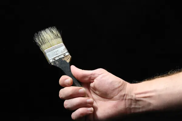 Brush and a Hand — Stock Photo, Image