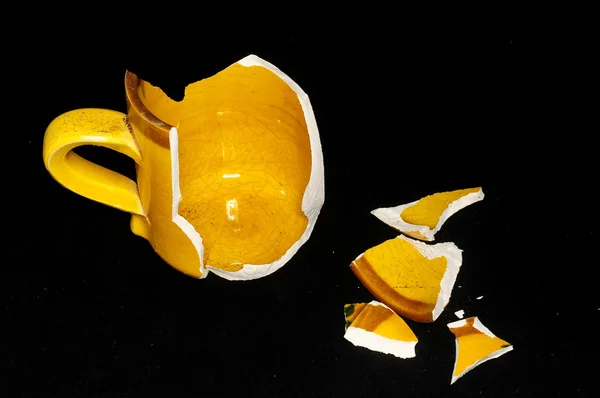 Złamane pomarańczowy kawa filiżanki — Zdjęcie stockowe