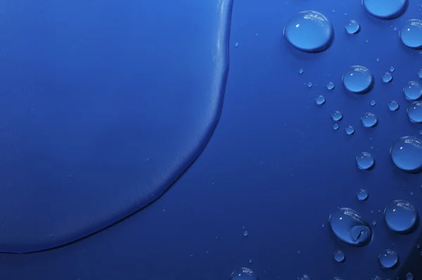 Gotas de agua azul — Foto de Stock