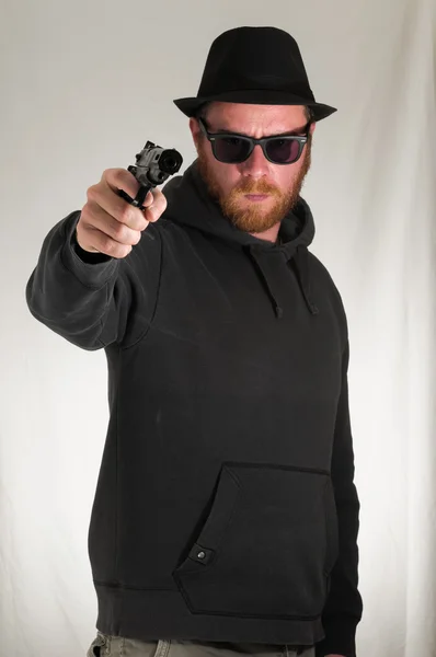 Man Holding a Pistol Gun — Stock Photo, Image