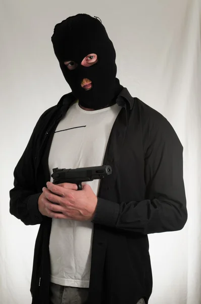 Man Holding a Pistol Gun — Stock Photo, Image