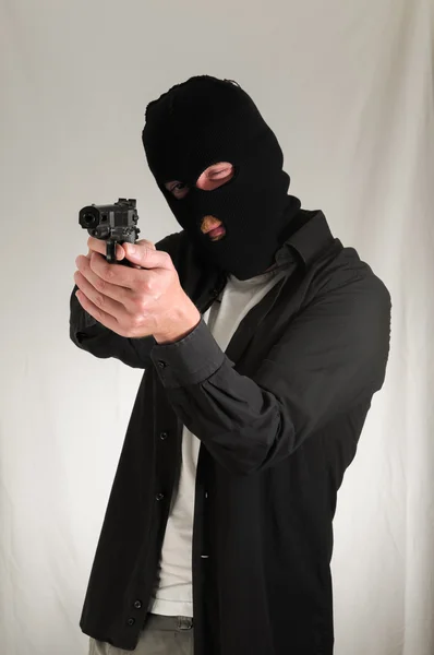 Man med en pistol pistol — Stockfoto