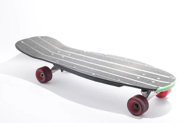 Altes gebrauchtes Holzskateboard — Stockfoto