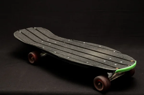 Oude gebruikte houten skateboard — Stockfoto