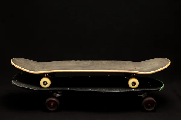 Altes gebrauchtes Holzskateboard — Stockfoto