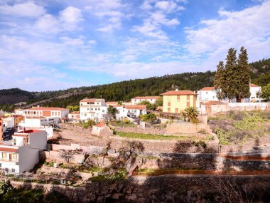 Village of Vilaflor is among a forest of pines in the mountain of Tenerife in the Spanish Canary Islands. clipart