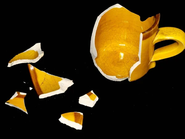 Broken Orange Coffee Cup Black Background — Stockfoto