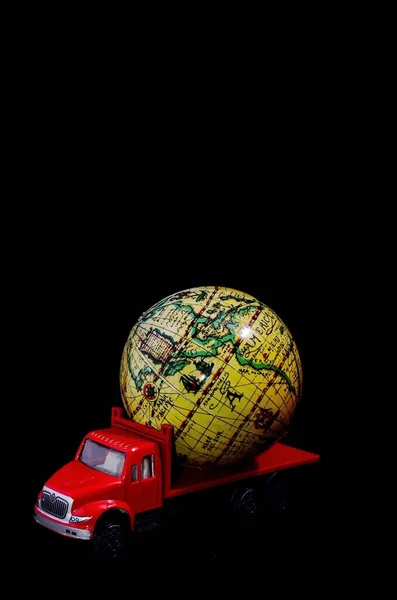 Toy Car Globe Back Black Background — Fotografia de Stock